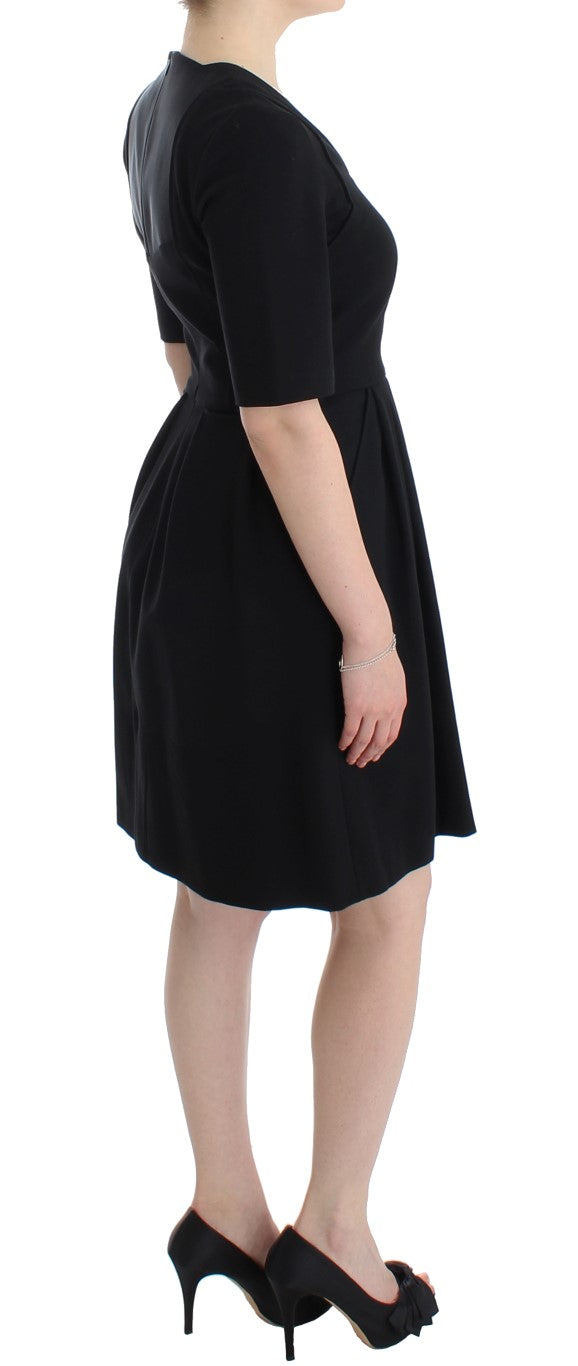 CO|TE Black short sleeve venus dress